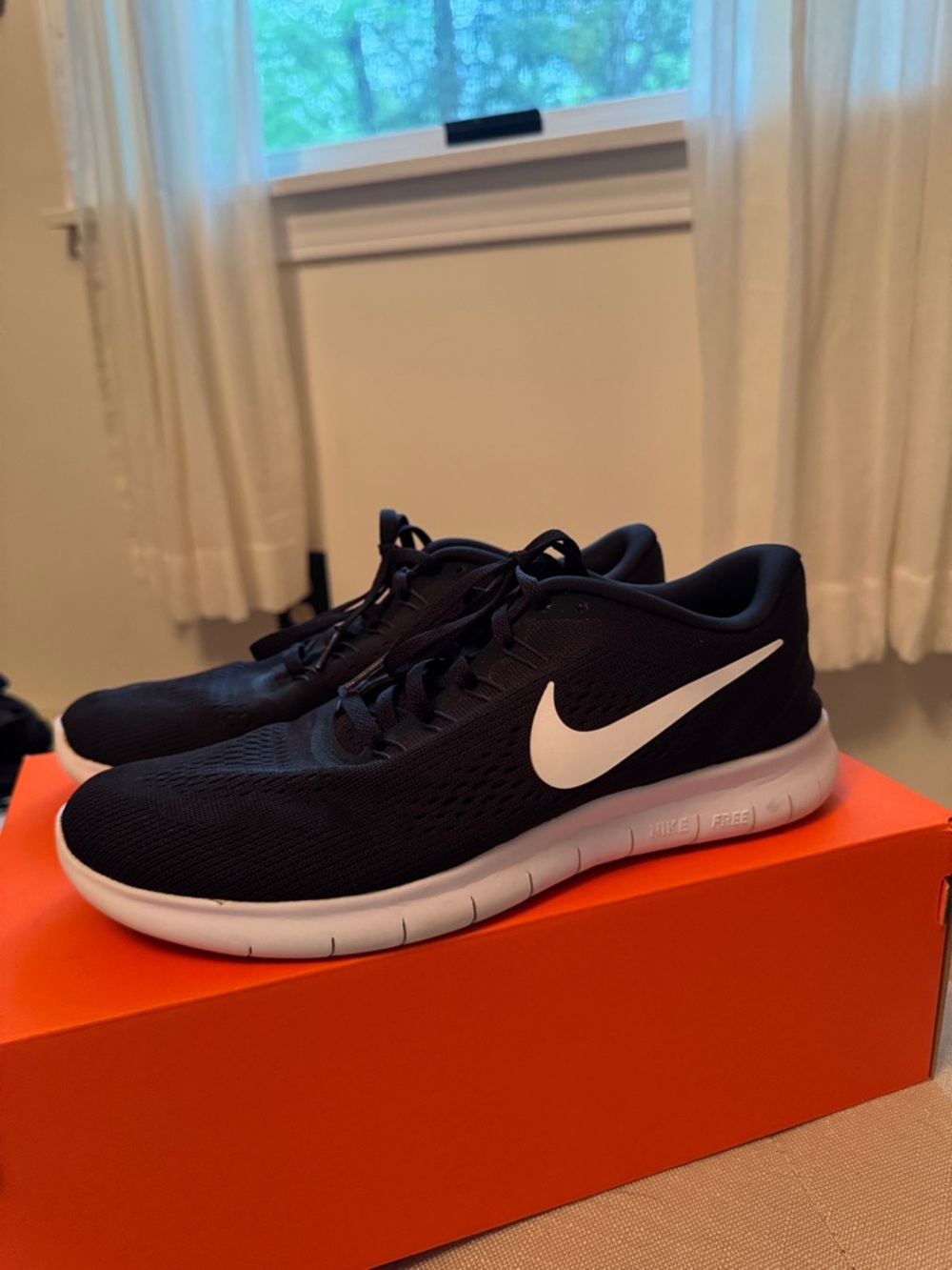 Woman’s Nike Black & White Sneakers
